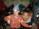 Tibetan tour guide with young family travelers  » Click to zoom ->