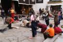 Pilgrims in front of Jokhang Temple  &raquo; Click to zoom ->