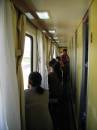 daytime, passengers in hard sleeprs seat outside for  pictures  » Click to zoom ->